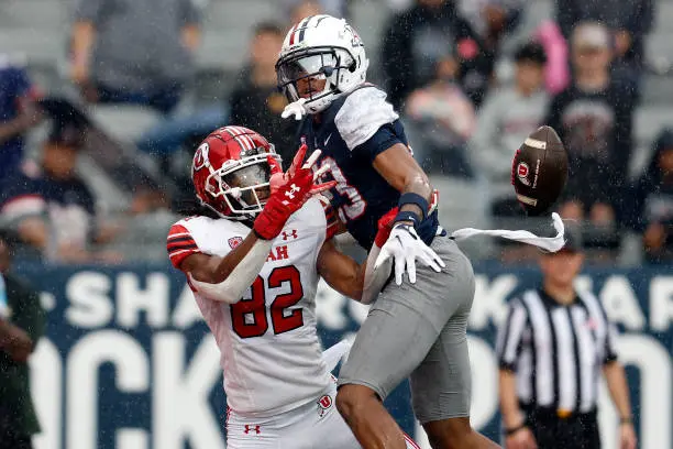 TUCSON, ARIZONA - NOVEMBER 18: Cornerback Tacario Davis #23 of the Arizona Wildcats breaks up a pass intended for tight end Landen King #82 of the Utah Utes during the first half at Arizona Stadium on November 18, 2023 in Tucson, Arizona. (Photo by Chris Coduto/Getty Images)