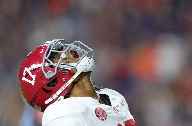 AUBURN, ALABAMA - NOVEMBER 25:  Isaiah Bond #17 of the Alabama Crimson Tide reacts after pulling in the game-winning touchdown against the Auburn Tigers during the fourth quarter at Jordan-Hare Stadium on November 25, 2023 in Auburn, Alabama. (Photo by Kevin C. Cox/Getty Images)