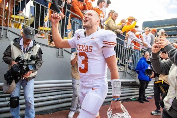 ANN ARBOR, MICHIGAN - SEPTEMBER 07: Quinn Ewers #3 of the Texas Longhorns walks off the field after winning a college football game against the Michigan Wolverines at Michigan Stadium on September 07, 2024 in Ann Arbor, Michigan. The Texas Longhorns won the game 31-12. (Photo by Aaron J. Thornton/Getty Images)