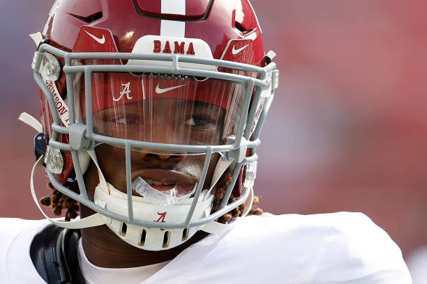 MADISON, WISCONSIN - SEPTEMBER 14: Jalen Milroe #4 of the Alabama Crimson Tide warms up before game against Wisconsin Badgers at Camp Randall Stadium on September 14, 2024 in Madison, Wisconsin. (Photo by John Fisher/Getty Images)