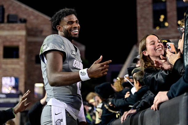 BOULDER, CO - OCTOBER 26:  Shedeur Sanders #2 of the Colorado Buffaloes greets supporters after a win against the Cincinnati Bearcats at Folsom Field on October 26, 2024 in Boulder, Colorado. (Photo by Dustin Bradford/Getty Images)