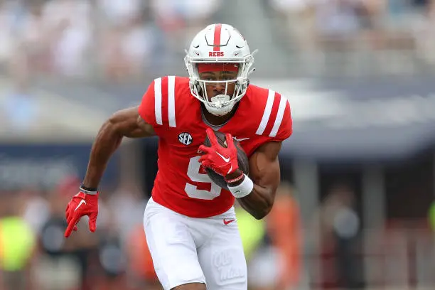 OXFORD, MISSISSIPPI - SEPTEMBER 02: Tre Harris #9 of the Mississippi Rebels carries the ball during the game against the Mercer Bears at Vaught-Hemingway Stadium on September 02, 2023 in Oxford, Mississippi. (Photo by Justin Ford/Getty Images)