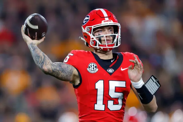 ATHENS, GEORGIA - NOVEMBER 16: Carson Beck #15 of the Georgia Bulldogs throws the ball during the first quarter against the Tennessee Volunteers at Sanford Stadium on November 16, 2024 in Athens, Georgia. (Photo by Todd Kirkland/Getty Images)