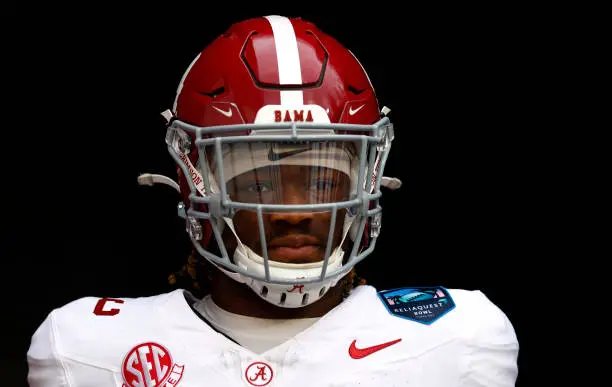 TAMPA, FLORIDA - DECEMBER 31: Jalen Milroe #4 of the Alabama Crimson Tide looks on before the game against the Michigan Wolverines during the 2024 ReliaQuest Bowl at Raymond James Stadium on December 31, 2024 in Tampa, Florida.  (Photo by Douglas P. DeFelice/Getty Images)