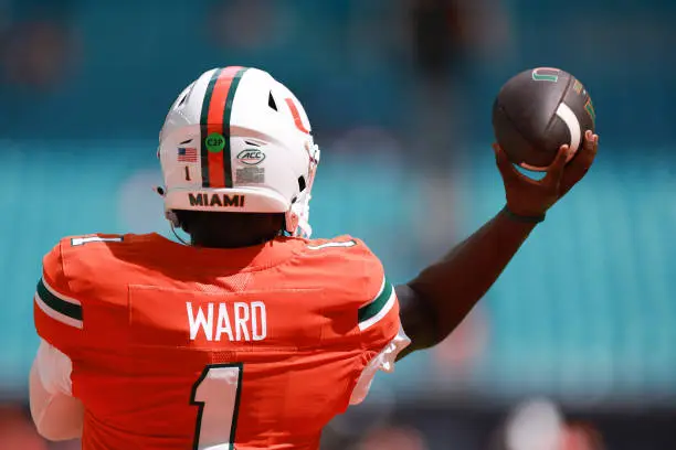 MIAMI GARDENS, FLORIDA - SEPTEMBER 14: Quarterback Cam Ward #1 of the Miami Hurricanes warms up prior to facing Ball State Cardinals at Hard Rock Stadium on September 14, 2024 in Miami Gardens, Florida. (Photo by Carmen Mandato/Getty Images)