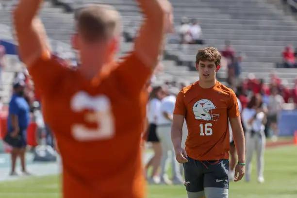 gettyimages-2177646982-612x612 DALLAS, TX - OCTOBER 12: Texas Longhorns quarterback Arch Manning (16) on the field for warmups as Texas Longhorns quarterback Quinn Ewers (3) stretches in the foreground before the Allstate Red River Rivalry SEC college football game between Texas Longhorns and Oklahoma Sooners on October 12, 2024, at Cotton Bowl Stadium in Dallas, TX. (Photo by David Buono/Icon Sportswire via Getty Images)