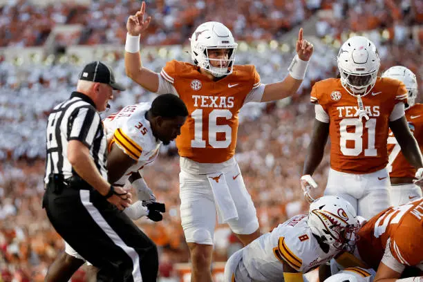 gettyimages-2173626580-612x612 AUSTIN, TEXAS - SEPTEMBER 21: Arch Manning #16 of the Texas Longhorns reacts after a rushing touchdown in the first quarter against the Louisiana Monroe Warhawks at Darrell K Royal-Texas Memorial Stadium on September 21, 2024 in Austin, Texas. (Photo by Tim Warner/Getty Images)