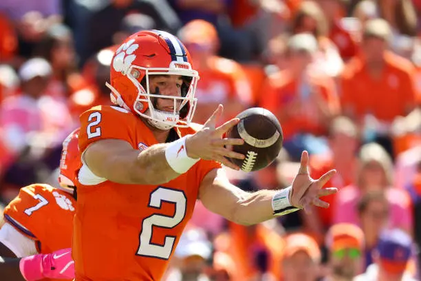 gettyimages-2180028341-612x612 CLEMSON, SOUTH CAROLINA - OCTOBER 19: Cade Klubnik #2 of the Clemson Tigers takes a high snap during the second quarter against the Virginia Cavaliers at Memorial Stadium on October 19, 2024 in Clemson, South Carolina. (Photo by Isaiah Vazquez/Getty Images)