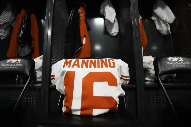 gettyimages-2191711261-612x612 ATLANTA, GEORGIA - JANUARY 1: A general view of the pads and jersey for Arch Manning #16 of the Texas Longhorns in the locker room prior to the game against the Arizona State Sun Devils at Mercedes-Benz Stadium on January 1, 2025 in Atlanta, Georgia. (Photo by CFP/Getty Images)