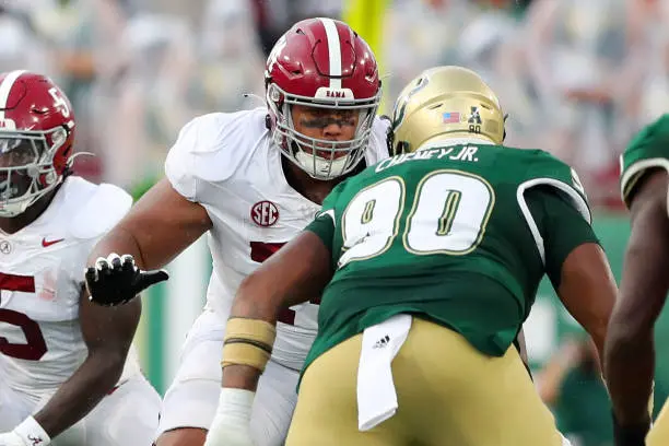 gettyimages-1670534448-612x612 TAMPA, FL - SEPTEMBER 16: Alabama Lineman Kadyn Proctor (74) pass blocks during the College Football game between the Alabama Crimson Tide and the South Florida Bulls on September 16, 2023 at Raymond James Stadium in Tampa, FL. (Photo by Cliff Welch/Icon Sportswire via Getty Images)