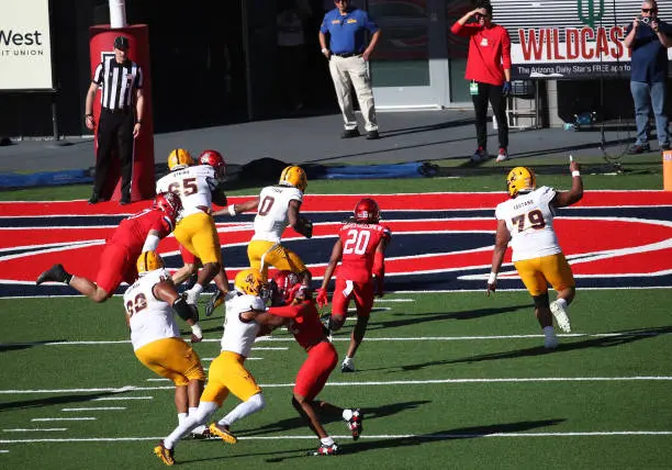 gettyimages-2187654002-612x612 TUCSON, ARIZONA - NOVEMBER 30: A general view of Jordyn Tyson #0 scoring a 13-yard touchdown is seen during the second quarter of the University of Arizona Wildcats versus the Arizona State Sun Devils football game at Arizona Stadium on November 30, 2024 in Tucson, Arizona. (Photo by Bruce Yeung/Getty Images)
