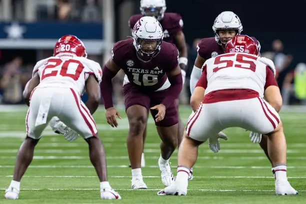 ARLINGTON, TX - SEPTEMBER 28: Texas A&amp;M Aggies linebacker Cashius Howell (#18) lines up before the snap during the college football game between the Arkansas Razorbacks and Texas A&amp;M Aggies on September 28, 2024, at AT&amp;T Stadium in Arlington, TX.  (Photo by Matthew Visinsky/Icon Sportswire via Getty Images)