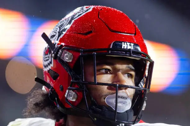 CHARLOTTESVILLE, VIRGINIA - SEPTEMBER 22: Kevin KC Concepcion #10 of the NC State Wolfpack runs for a touchdown in the second half during a game against the Virginia Cavaliers at Scott Stadium on September 22, 2023 in Charlottesville, Virginia. (Photo by Ryan M. Kelly/Getty Images)