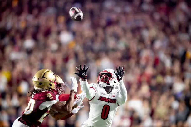 CHESTNUT HILL, MASSACHUSETTS - OCTOBER 25: Chris Bell #0 of the Louisville Cardinals misses a pass during the first quarter of a game against the Boston College Eagles at Alumni Stadium on October 25, 2024 in Chestnut Hill, Massachusetts. (Photo by Maddie Malhotra/Getty Images)