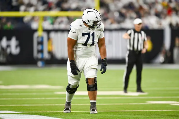 INDIANAPOLIS, IN - DECEMBER 07: Penn State Nittany Lions OL Olaivavega Ioane (71) lines up at wide receiver during the Big Ten Championship football game between the Penn State Nittany Lions and the Oregon Ducks on December 7, 2024 at Lucas Oil Stadium in Indianapolis, IN (Photo by James Black/Icon Sportswire via Getty Images)