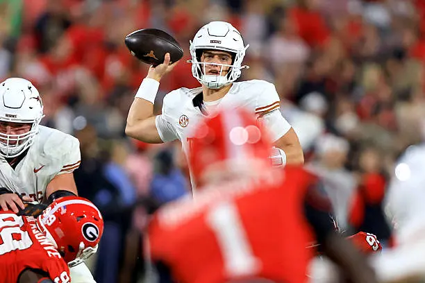 ATHENS, GA - NOVEMBER 15: Quarterback Arch Manning (16) of the Texas Longhorns looks for a receiver during the Saturday evening college football game between the Georgia Bulldogs and the Texas Longhorns on November 15, 2025 at Sanford Stadium in Athens, GA.  (Photo by David J. Griffin/Icon Sportswire via Getty Images)