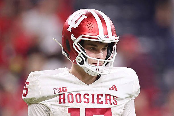 INDIANAPOLIS, INDIANA - DECEMBER 06: Fernando Mendoza #15 of the Indiana Hoosiers looks on against the Ohio State Buckeyes in the 2025 Big Ten Football Championship at Lucas Oil Stadium on December 06, 2025 in Indianapolis, Indiana.  (Photo by Michael Reaves/Getty Images)