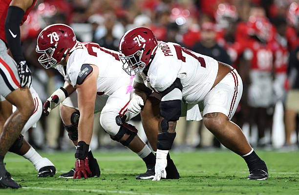 ATHENS, GEORGIA - SEPTEMBER 27:  Kadyn Proctor #74 of the Alabama Crimson Tide lines up against the Georgia Bulldogs during the second quarter at Sanford Stadium on September 27, 2025 in Athens, Georgia. (Photo by Kevin C. Cox/Getty Images)
