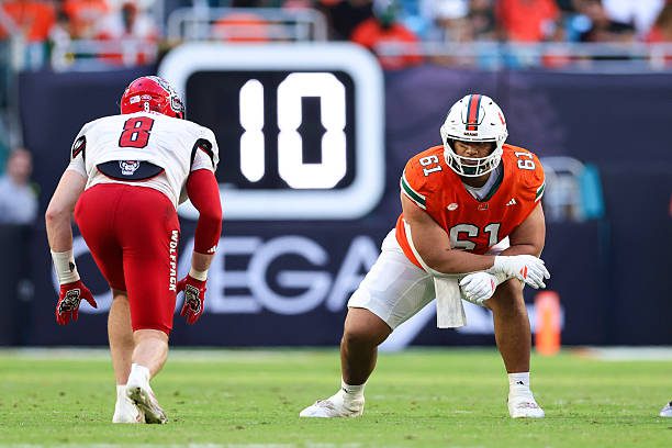 MIAMI GARDENS, FLORIDA - NOVEMBER 15: Francis Mauigoa #61 of the Miami Hurricanes plays against the NC State Wolfpack during the second quarter of the game at Hard Rock Stadium on November 15, 2025 in Miami Gardens, Florida. (Photo by Megan Briggs/Getty Images)
