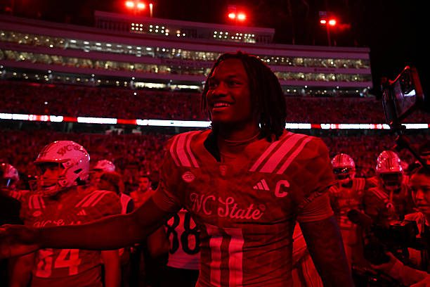 RALEIGH, NC - AUGUST 28: Quarterback CJ Bailey #11 of the NC State Wolfpack celebrates with teammates after the College Football game between the NC State Wolfpack and the East Carolina Pirates on August 28, 2025 at Carter-Finley Stadium in Raleigh, North Carolina. (Photo by Katherine Gawlik/Icon Sportswire via Getty Images)