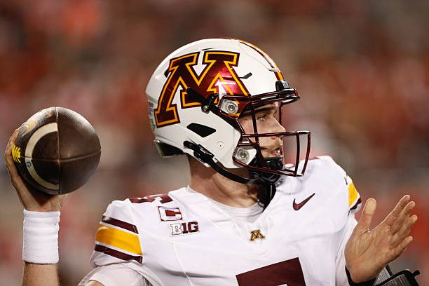 COLUMBUS, OH - OCTOBER 04: Minnesota Golden Gophers quarterback Drake Lindsey (5) warms up on the sideline during the game against the Minnesota Golden Gophers and the Ohio State Buckeyes on October 4, 2025, at Ohio Stadium in Columbus, OH. (Photo by Ian Johnson/Icon Sportswire via Getty Images)