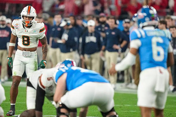 GLENDALE, ARIZONA - JANUARY 8: Jakobe Thomas #8 of the Miami Hurricanes watches against Trinidad Chambliss #6 of the Ole Miss Rebels during the second half of CFP Semifinal Vrbo Fiesta Bowl at State Farm Stadium on January 8, 2026 in Glendale, Arizona. (Photo by CFP/Getty Images)