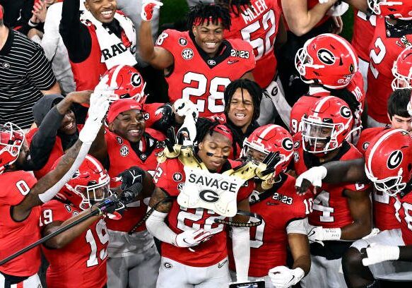 INGLEWOOD, CALIFORNIA - JANUARY 09: Javon Bullard #22 of the Georgia Bulldogs reacts with teammates after his second interception late in the second quarter against the TCU Horned Frogs in the College Football Playoff National Championship game at SoFi Stadium on January 09, 2023 in Inglewood, California. (Photo by Kevork Djansezian/Getty Images)