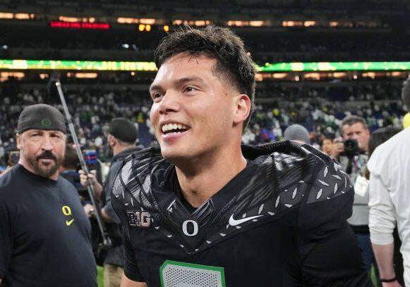 INDIANAPOLIS, INDIANA - DECEMBER 07: Dillon Gabriel #8 of the Oregon Ducks celebrates after beating the Penn State Nittany Lions 45-37 to win the 2024 Big Ten Football Championship at Lucas Oil Stadium on December 07, 2024 in Indianapolis, Indiana. (Photo by Dylan Buell/Getty Images)