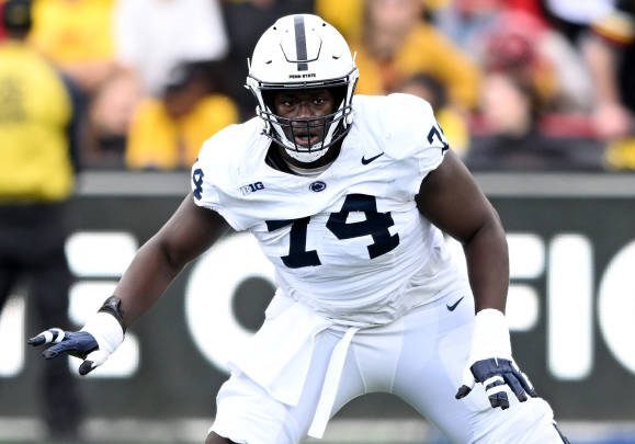 COLLEGE PARK, MARYLAND - NOVEMBER 04: Olumuyiwa Fashanu #74 of the Penn State Nittany Lions blocks against the Maryland Terrapins at SECU Stadium on November 04, 2023 in College Park, Maryland. (Photo by G Fiume/Getty Images)