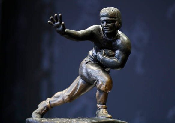 INDIANAPOLIS, IN - JANUARY 08: The Heisman Trophy on display in downtown Indianapolis for the 2022 NCAA Men's College Football National Championship Game as seen on January 8, 2022 in Indianapolis, IN. (Photo by Brian Spurlock/Icon Sportswire via Getty Images)