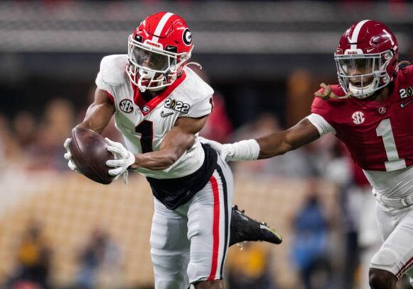 INDIANAPOLIS, IN - JANUARY 10: Georgia Bulldogs WR George Pickens (1) catches a deep pass against Alabama Crimson Tide DB Kool-Aid McKinstry (1) during the Alabama Crimson Tide versus the Georgia Bulldogs in the College Football Playoff National Championship, on January 10, 2022, at Lucas Oil Stadium in Indianapolis, IN. (Photo by Zach Bolinger/Icon Sportswire via Getty Images)