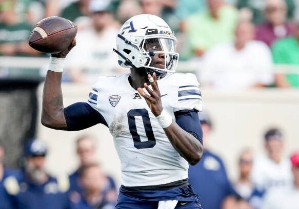 EAST LANSING, MICHIGAN - SEPTEMBER 10: DJ Irons #0 of the Akron Zips throws the ball against the Michigan State Spartans during the first quarter at Spartan Stadium on September 10, 2022 in East Lansing, Michigan. (Photo by Nic Antaya/Getty Images)