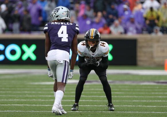 MANHATTAN, KS - SEPTEMBER 10: Missouri Tigers defensive back Kris Abrams-Draine (14) lines up to defend Kansas State Wildcats wide receiver Malik Knowles (4) in the third quarter of a college football game between the Missouri Tigers and Kansas State Wildcats on September 10, 2022 at Bill Snyder Family Football Stadium in Manhattan, KS.  Photo by Scott Winters/Icon Sportswire via Getty Images)