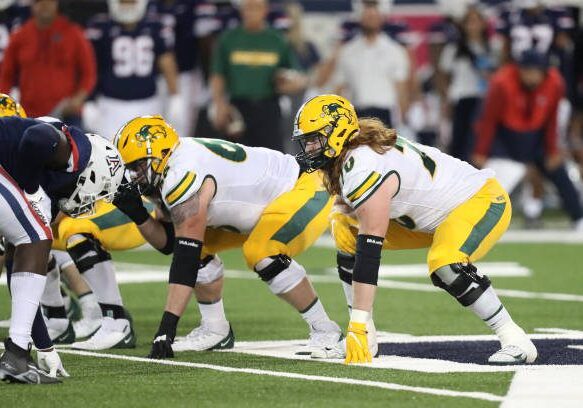TUCSON, AZ - SEPTEMBER 17: North Dakota State Bison offensive tackle Cody Mauch #70 and North Dakota State Bison guard Nash Jensen #66 during a college football game between the North Dakota State Bison and the University of Arizona Wildcats on September 17, 2022 at Arizona Stadium in Tucson, AZ.  (Photo by Christopher Hook/Icon Sportswire via Getty Images)