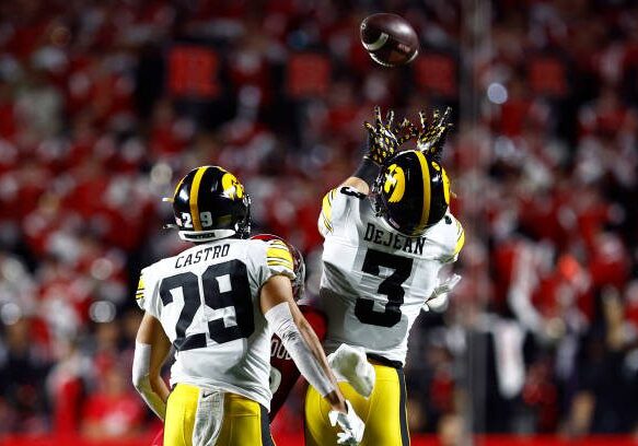 PISCATAWAY, NJ - SEPTEMBER 24: Defensive back Cooper DeJean #3 of the Iowa Hawkeyes intercepts a pass and returns for a touchdown against the Rutgers Scarlet Knights  during the first quarter of a game at SHI Stadium on September 24, 2022 in Piscataway, New Jersey. (Photo by Rich Schultz/Getty Images)