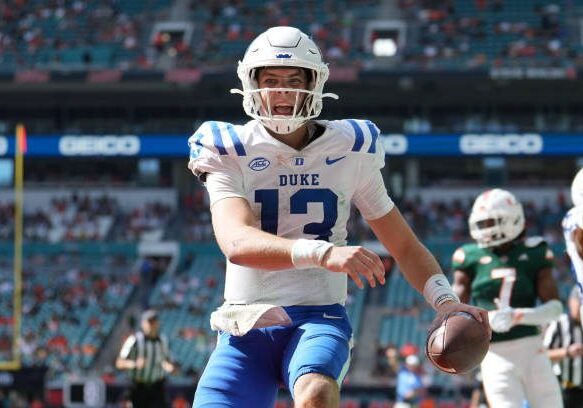 MIAMI GARDENS, FL - OCTOBER 22: Duke Blue Devils quarterback Riley Leonard (13) celebrates his rushing touchdown during the game between the Duke Blue Devils and the Miami Hurricanes on Saturday, October 22, 2022 at Hard Rock Stadium, Miami Gardens, FL (Photo by Peter Joneleit/Icon Sportswire via Getty Images)