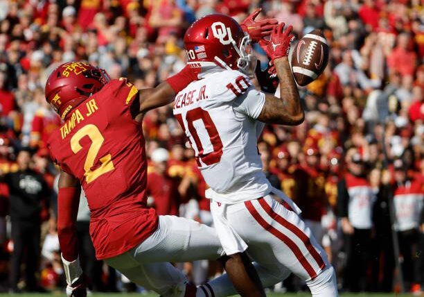 AMES, IA - OCTOBER 29:  Defensive back T.J. Tampa #2 of the Iowa State Cyclones breaks up a pass meant for wide receiver Theo Wease #10 of the Oklahoma Sooners in the first half of play at Jack Trice Stadium on October 29, 2022 in Ames, Iowa. (Photo by David Purdy/Getty Images)
