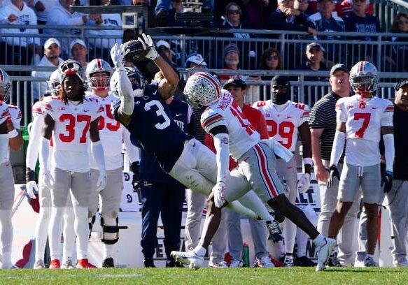 UNIVERSITY PARK, PA - OCTOBER 29: Penn State Nittany Lions Wide Receiver Parker Washington (3) makes a catch with Ohio State Buckeyes Safety Tanner McCalister (15) defending during the second half of the college football game between the Ohio State Buckeyes and the Penn State Nittany Lions on October 29, 2022, at Beaver Stadium in University Park, PA. (Photo by Gregory Fisher/Icon Sportswire via Getty Images)