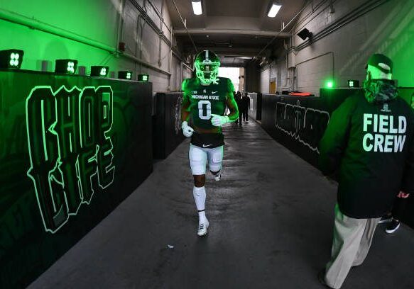 EAST LANSING, MI - NOVEMBER 12: Michigan State Spartans wide receiver Keon Coleman (0) runs through the tunnel before a college football game between the Michigan State Spartans and Rutgers Scarlet Knights on November 12, 2022 at Spartan Stadium in East Lansing, MI (Photo by Adam Ruff/Icon Sportswire via Getty Images)