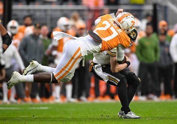 KNOXVILLE, TN - NOVEMBER 12: Tennessee Volunteers defensive lineman James Pearce Jr. (27) tackles Missouri Tigers quarterback Brady Cook (12) during the college football game between the Tennessee Volunteers and the Missouri Tigers on November 12, 2022, at Neyland Stadium, in Knoxville, TN. (Photo by Bryan Lynn/Icon Sportswire via Getty Images)
