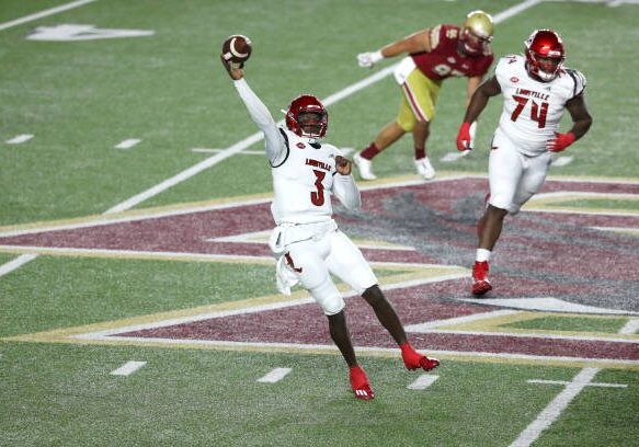 CHESTNUT HILL, MASSACHUSETTS - NOVEMBER 28: Malik Cunningham #3 of the Louisville Cardinals throws against the Boston College Eagles at Alumni Stadium on November 28, 2020 in Chestnut Hill, Massachusetts. (Photo by Maddie Meyer/Getty Images)