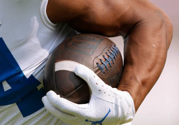 STANFORD, CALIFORNIA - SEPTEMBER 25: A detailed view of a Wilson NCAA football being carried by Zach Charbonnet #24 of the UCLA Bruins during warm ups prior to the start of the game against the Stanford Cardinal at Stanford Stadium on September 25, 2021 in Stanford, California. (Photo by Thearon W. Henderson/Getty Images)