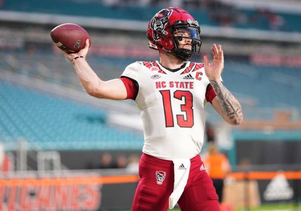 MIAMI GARDENS, FLORIDA - OCTOBER 23: Devin Leary #13 of the North Carolina State Wolfpack warms up prior to the game against the Miami Hurricanes at Hard Rock Stadium on October 23, 2021 in Miami Gardens, Florida. (Photo by Mark Brown/Getty Images)