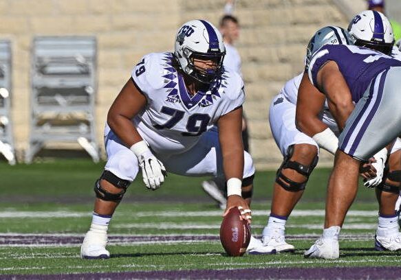 MANHATTAN, KS - OCTOBER 30:  Center Steve Avila #79 of the TCU Horned Frogs gets set to snap the ball during the first half against the Kansas State Wildcats at Bill Snyder Family Football Stadium on October 30, 2021 in Manhattan, Kansas. (Photo by Peter G. Aiken/Getty Images)
