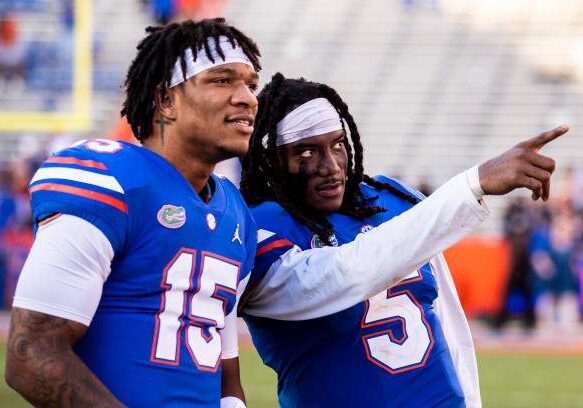 GAINESVILLE, FLORIDA - NOVEMBER 13: Emory Jones #5 and Anthony Richardson #15 of the Florida Gators look on after defeating the Samford Bulldogs 70-52 in a game at Ben Hill Griffin Stadium on November 13, 2021 in Gainesville, Florida. (Photo by James Gilbert/Getty Images)