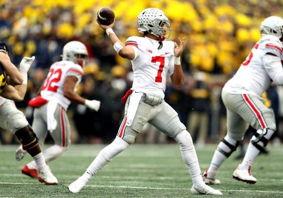 ANN ARBOR, MICHIGAN - NOVEMBER 27: C.J. Stroud #7 of the Ohio State Buckeyes throws a pass in the second half of the game against the Michigan Wolverines at Michigan Stadium on November 27, 2021 in Ann Arbor, Michigan. (Photo by Mike Mulholland/Getty Images)