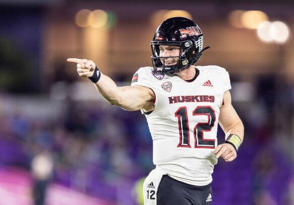 ORLANDO, FLORIDA - DECEMBER 17: Rocky Lombardi #12 of the Northern Illinois Huskies reacts during the first half of the 2021 Cure Bowl against the Coastal Carolina Chanticleers at Exploria Stadium on December 17, 2021 in Orlando, Florida. (Photo by James Gilbert/Getty Images)