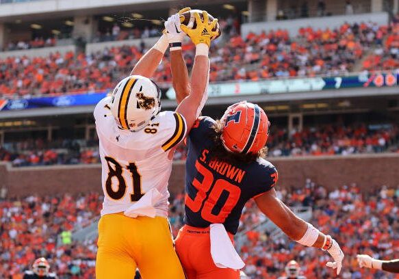 CHAMPAIGN, ILLINOIS - AUGUST 27: Sydney Brown #30 of the Illinois Fighting Illini breaks up a pass in the endzone intended for Treyton Welch #81 of the Wyoming Cowboys during the first half at Memorial Stadium on August 27, 2022 in Champaign, Illinois. (Photo by Michael Reaves/Getty Images)