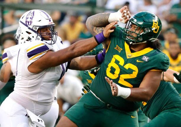 WACO, TX -SEPTEMBER 3: Siaki Ika #62 of the Baylor Bears plays against the Albany Great Danes at McLane Stadium on September 3, 2022 in Waco, Texas. (Photo by Ron Jenkins/Getty Images)