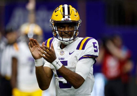NEW ORLEANS, LOUISIANA - SEPTEMBER 04: Quarterback Jayden Daniels #5 of the LSU Tigers reacts after a touchdown against the Florida State Seminoles at Caesars Superdome on September 04, 2022 in New Orleans, Louisiana. (Photo by Chris Graythen/Getty Images)